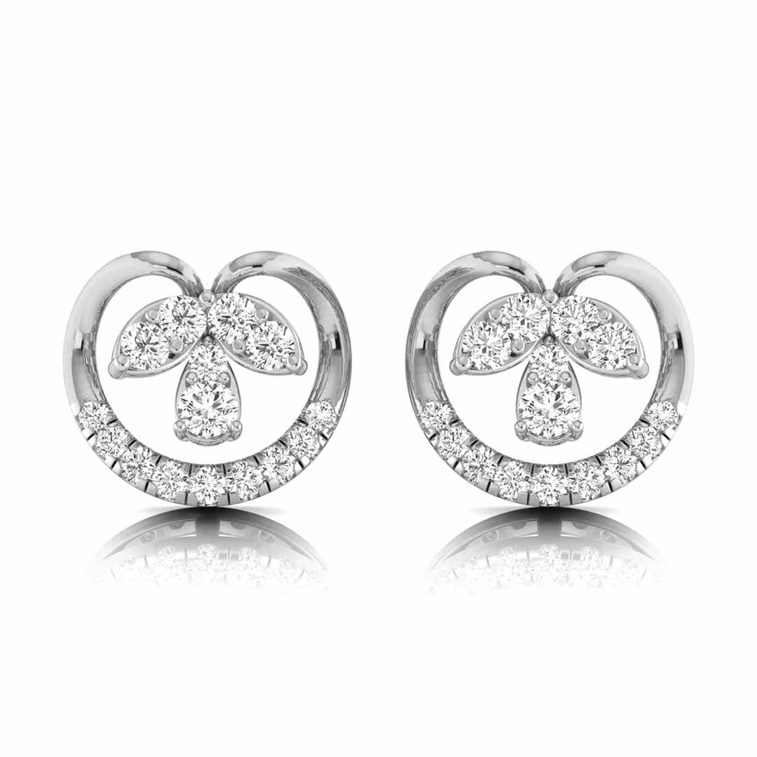 Pair of white gold stud earrings with diamond accents on a white background