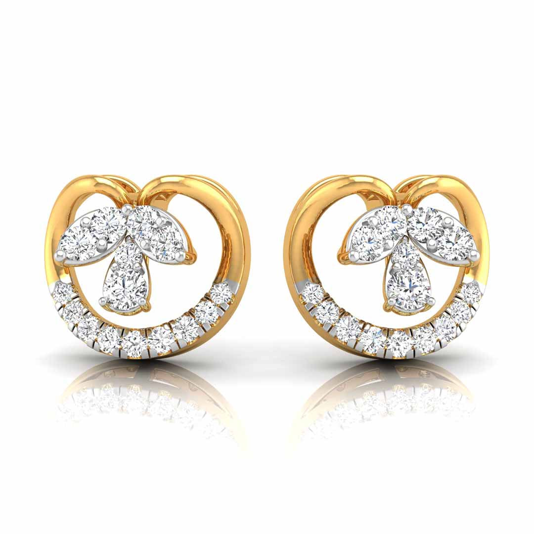 Pair of gold and diamond earrings on a white background