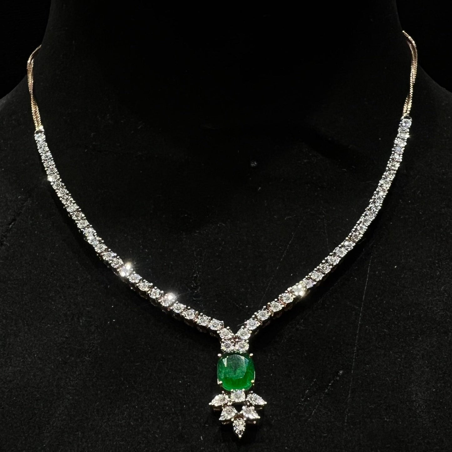 Designer diamond necklace set for women with color stone pendant.