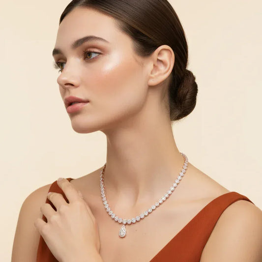 Woman wearing a real diamond necklace against a beige background