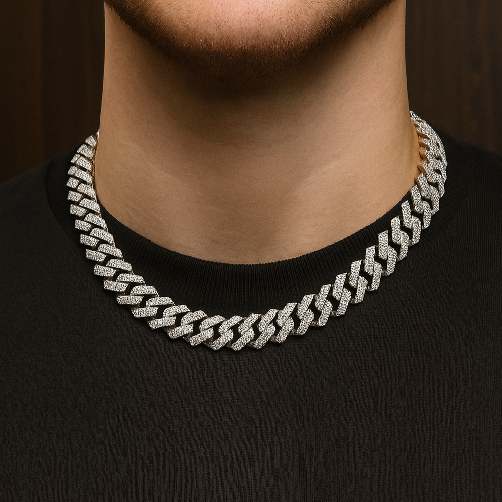 Luxury gold Cuban chain necklace with pavé-set diamonds and bold interlocking links for a stylish statement look.