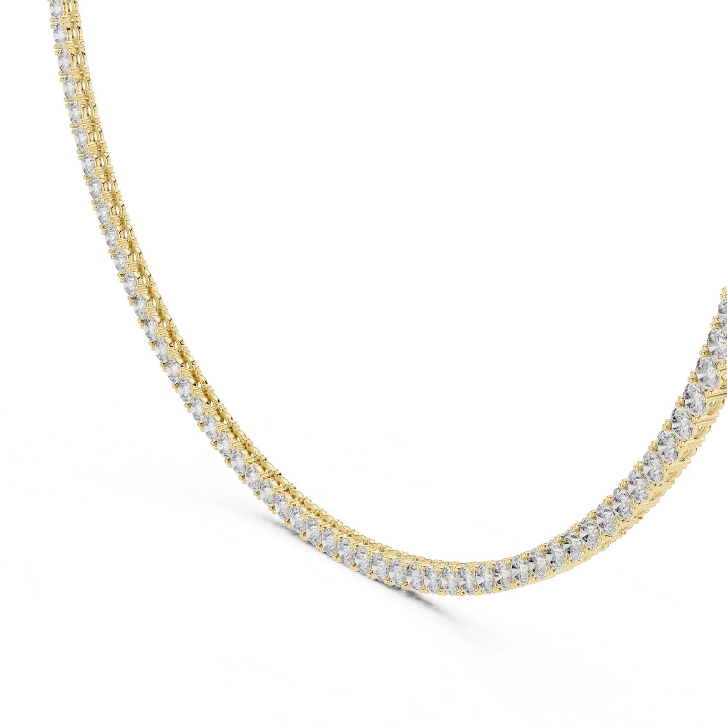 Yellow gold tennis necklace with lab grown diamonds on a white background