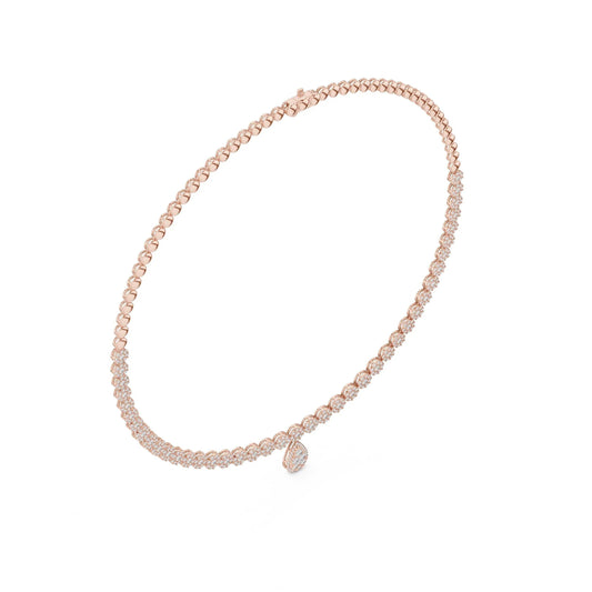 Rose gold tennis necklace with lab grown diamonds set in pave setting with a small diamond pendant on a white background