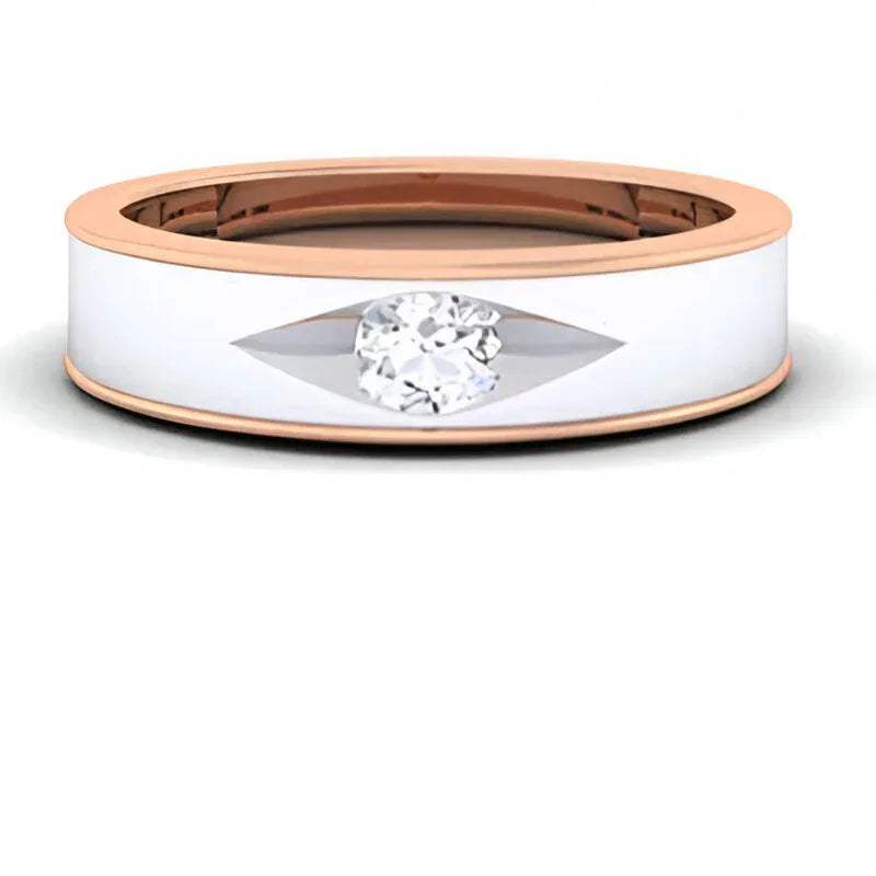 two tone gold ring with a central diamond on a white background