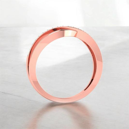 Rose gold ring on a light gray background