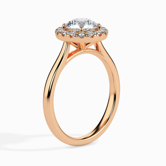 Rose gold ring with a diamond on a white background