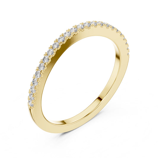 Yellow gold ring with small natural round diamonds on a white background