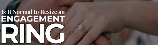 Close-up of a hand wearing an engagement ring with the text 'Is It Normal to Resize an Engagement Ring'.