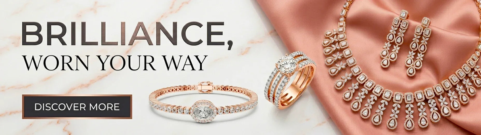 Jewelry set including rings and a necklace with 'Brilliance, Worn Your Way' text on a marble background.