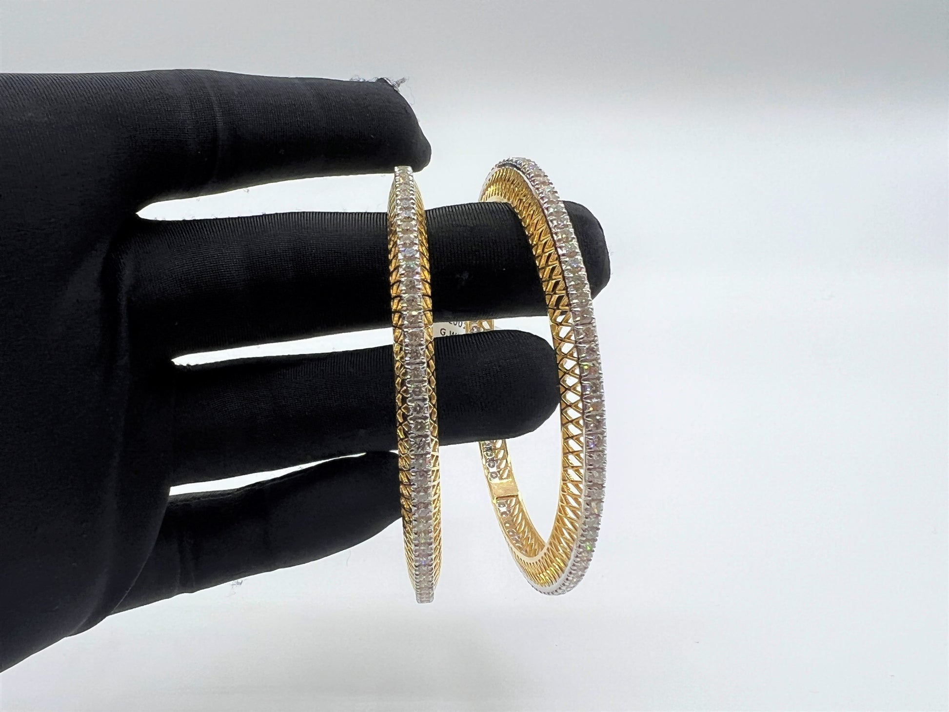 Elegant diamond bangle set in gold with full diamond studded design, perfect for weddings, parties, and special occasions.