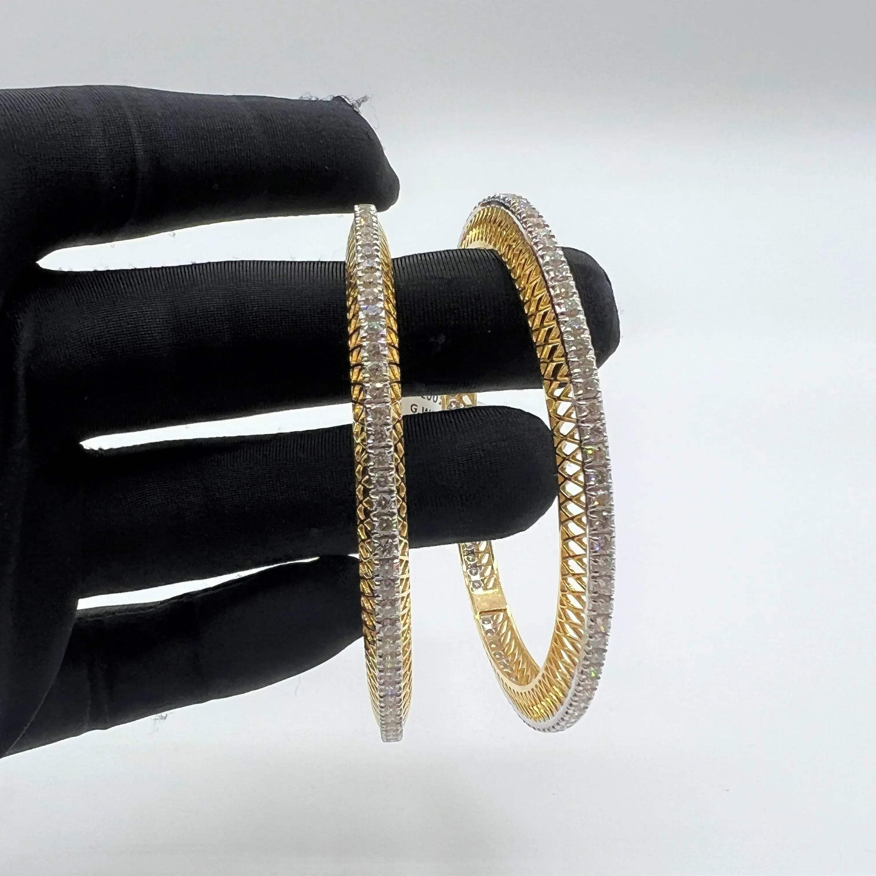 Elegant diamond bangle set in gold with full diamond studded design, perfect for weddings, parties, and special occasions.