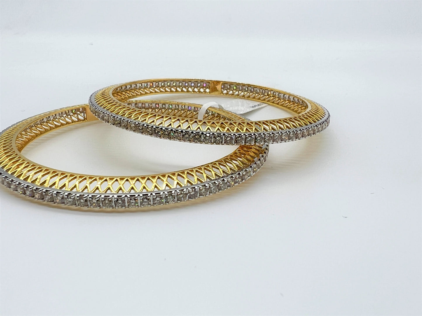 Elegant diamond bangle set in gold with full diamond studded design, perfect for weddings, parties, and special occasions.