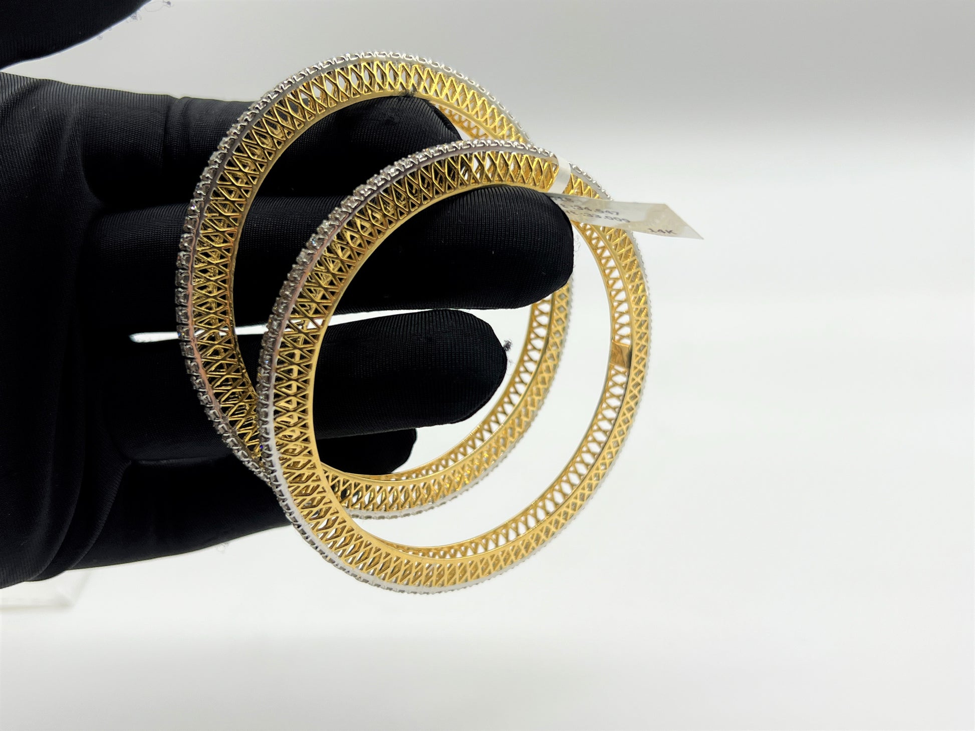 Elegant diamond bangle set in gold with full diamond studded design, perfect for weddings, parties, and special occasions.