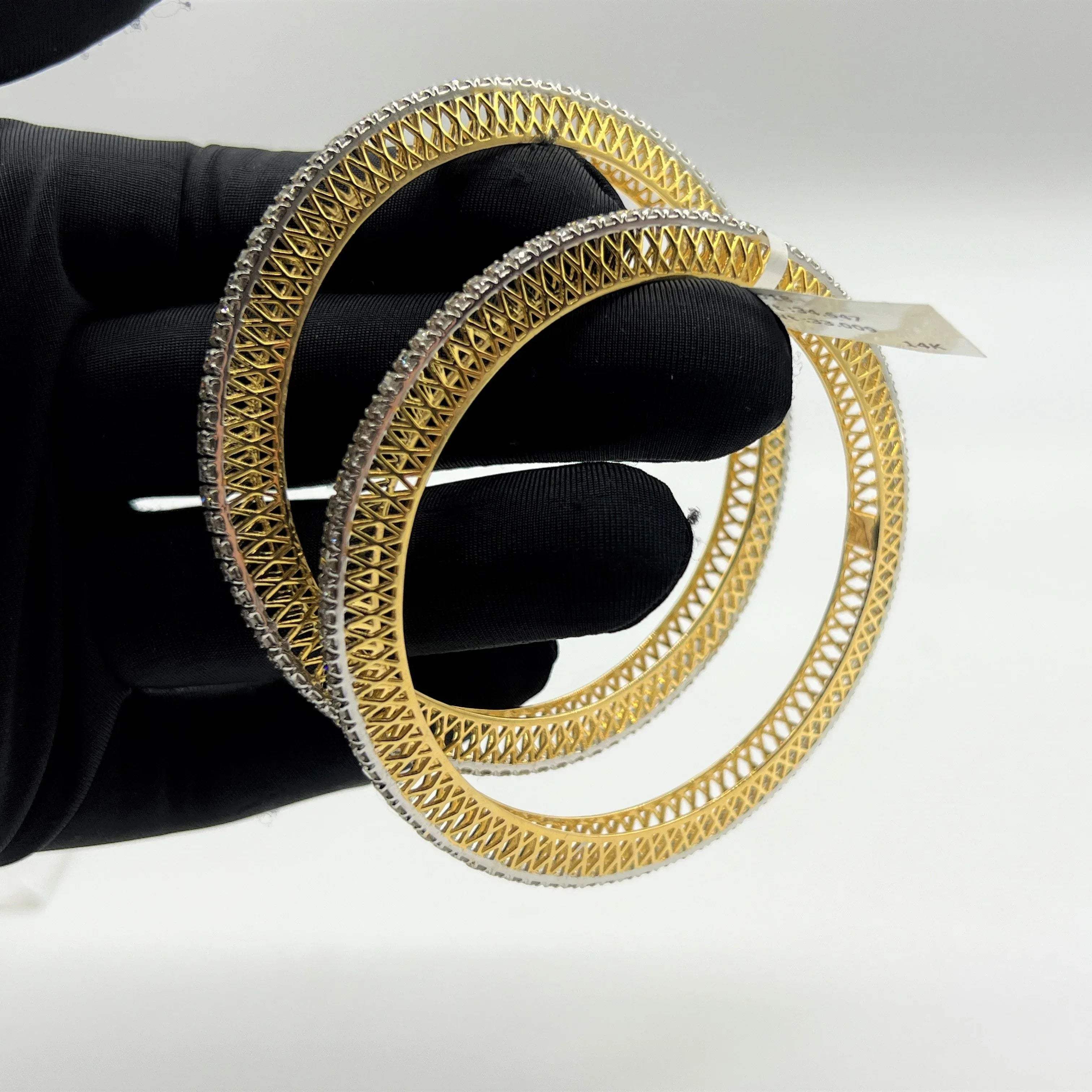 Elegant diamond bangle set in gold with full diamond studded design, perfect for weddings, parties, and special occasions.