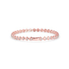 Rose gold bracelet with small diamonds on a white background