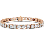 Rose gold bracelet with real diamonds on a white background