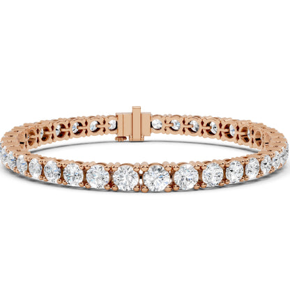Rose gold bracelet with real diamonds on a white background