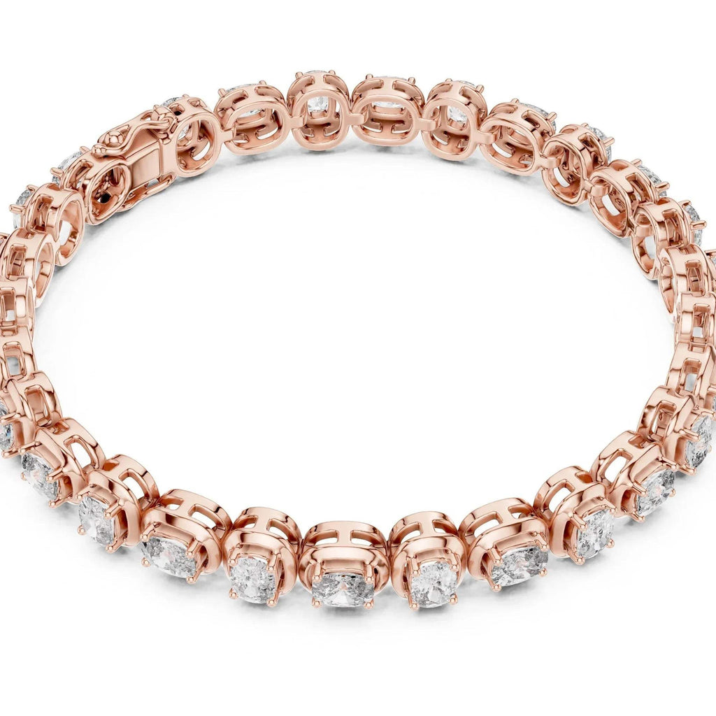 Rose gold tennis bracelet with real diamonds on a white background