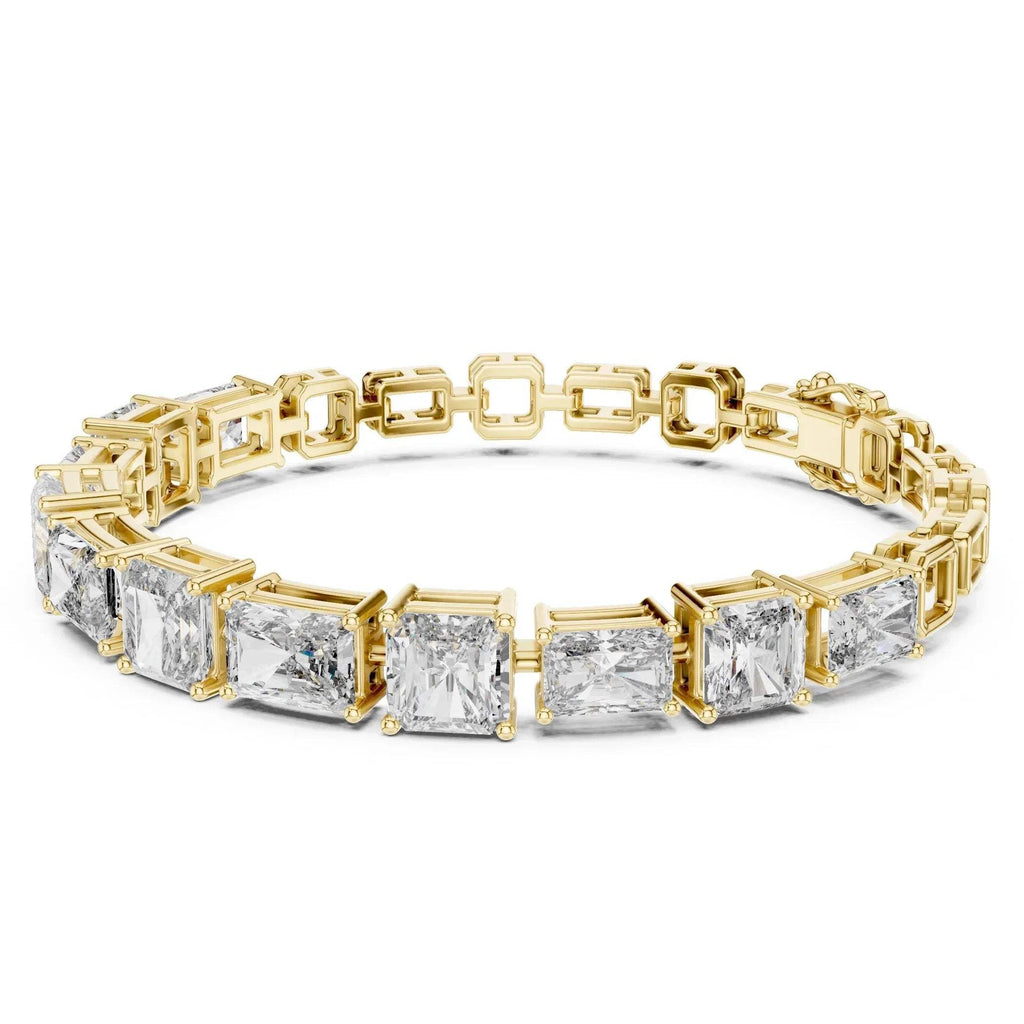 Yellow gold bracelet with rectangular and square-cut real diamonds on a white background