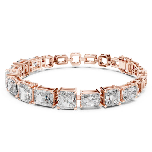Rose gold bracelet with clear real radiant and emerald shape diamonds on a white background