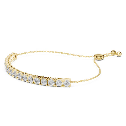 Yellow gold bracelet with real diamond accents on a white background