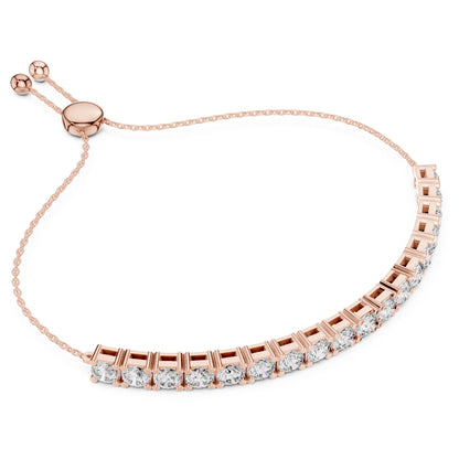 Rose gold bracelet with real diamond accents on a white background