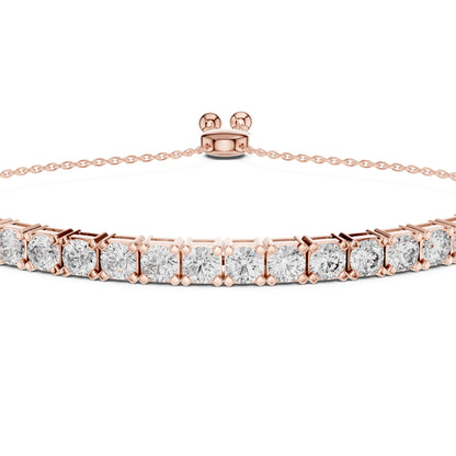 Rose gold bracelet with real diamonds on a white background