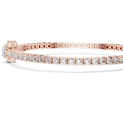 Rose gold bracelet with real diamonds on a white background