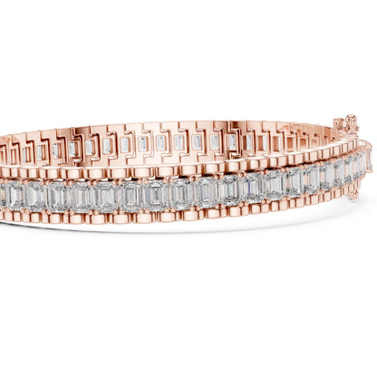 Rose gold bracelet with real diamonds on a white background