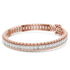 Rose gold bracelet with real diamond accents on a white background