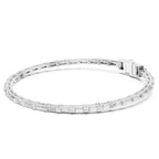 White gold bracelet with real baguette shape diamonds on a white background