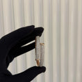 Luxury rose gold diamond bracelet featuring multiple rows of sparkling diamonds in a stylish cuff shape.