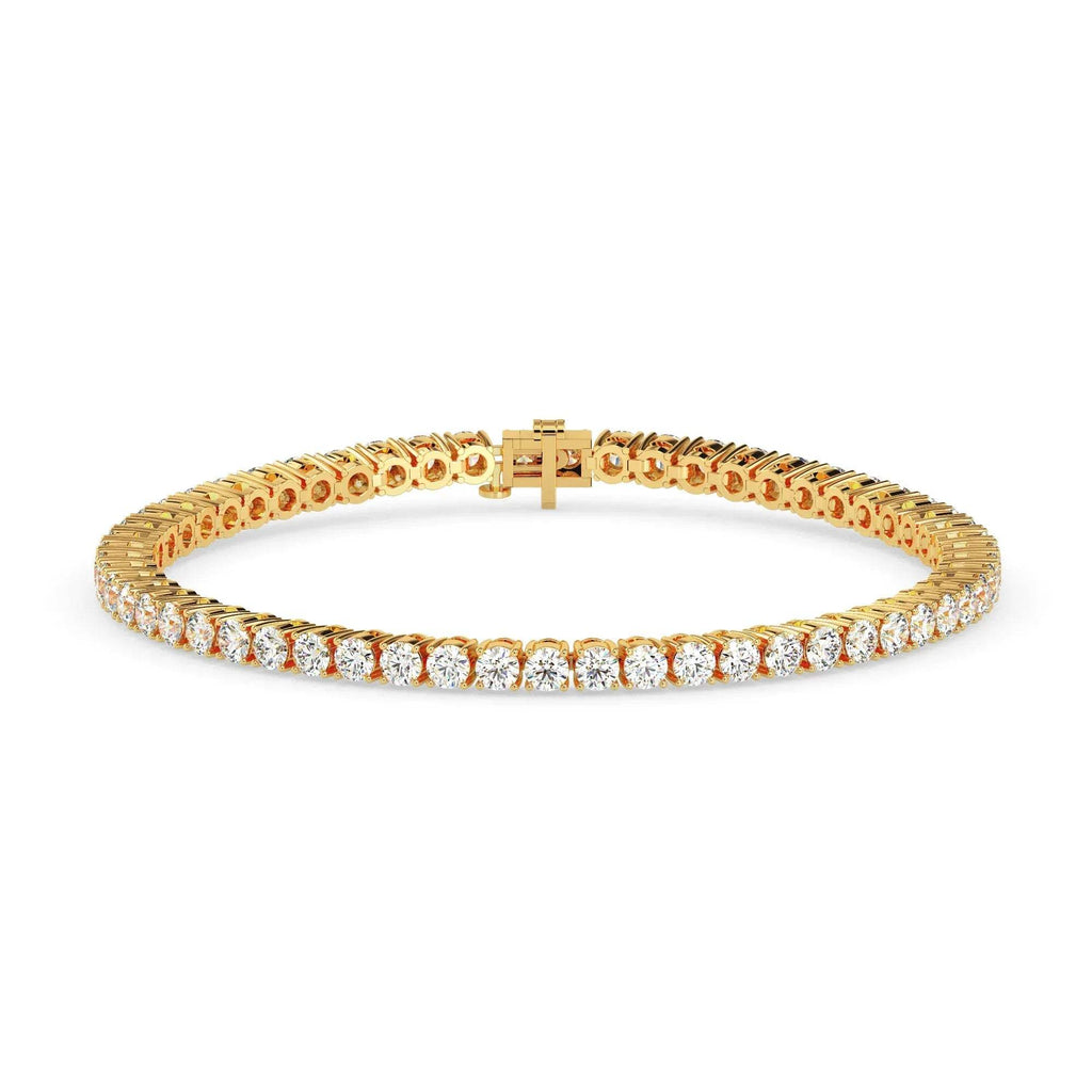 Gold bracelet with diamonds on a white background