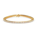 Gold bracelet with diamonds on a white background