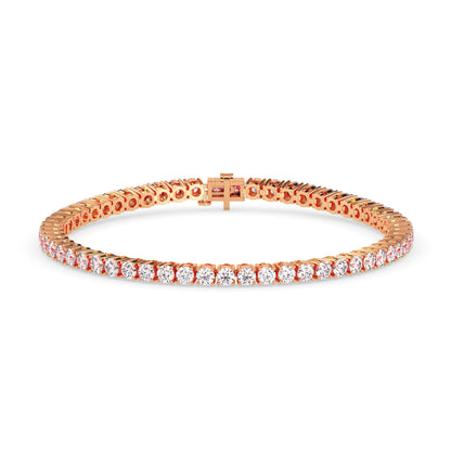 Rose gold bracelet with clear stones on a white background