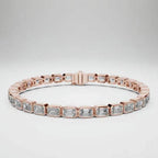 Rose gold bracelet with emerald cut real diamond accents on a white background