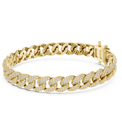 Gold chain bracelet with real diamond accents on a white background