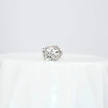 Round solitaire diamond stud earring on a white background