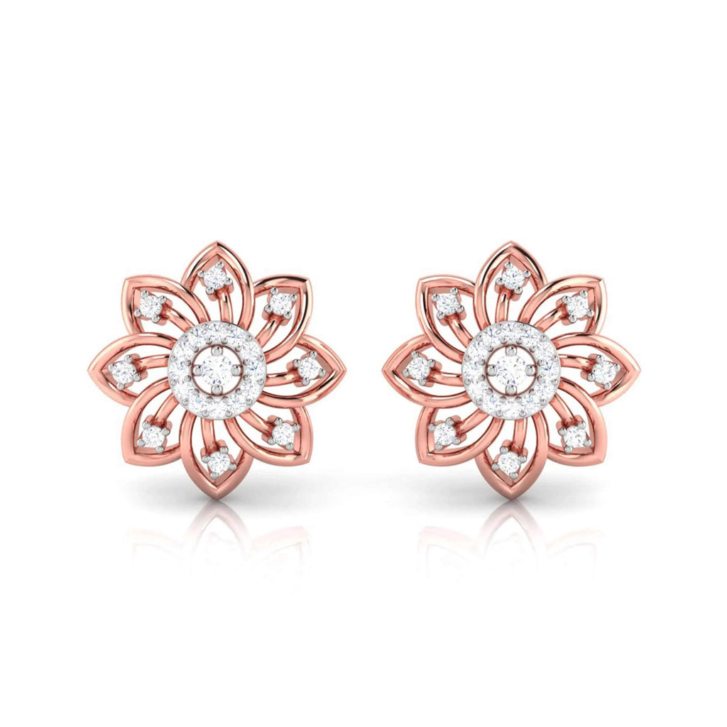 gold flower-shaped earrings with diamond accents on a white background