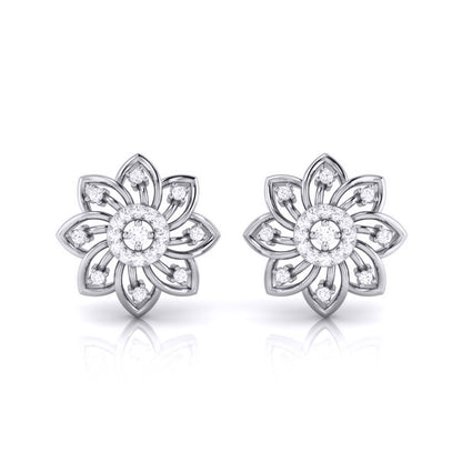 Pair of white gold flower-shaped earrings with clear gemstones on a white background