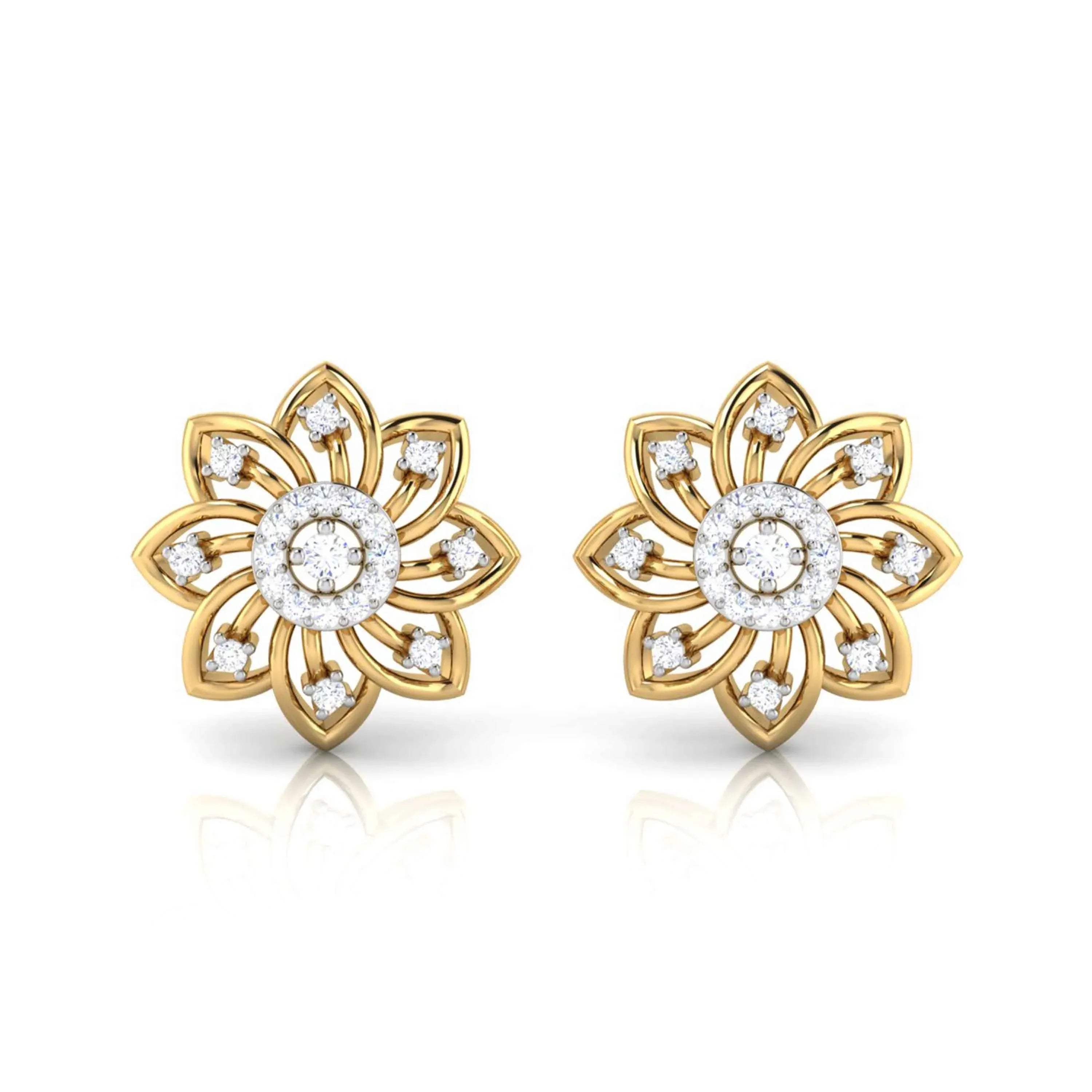 Gold flower-shaped earrings with diamond accents on a white background