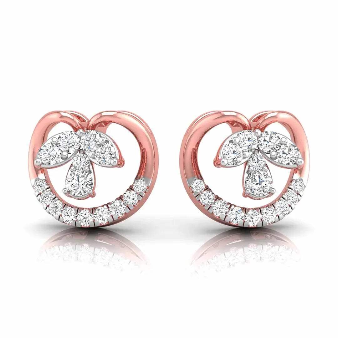 gold heart-shaped earrings with diamond accents on a white background