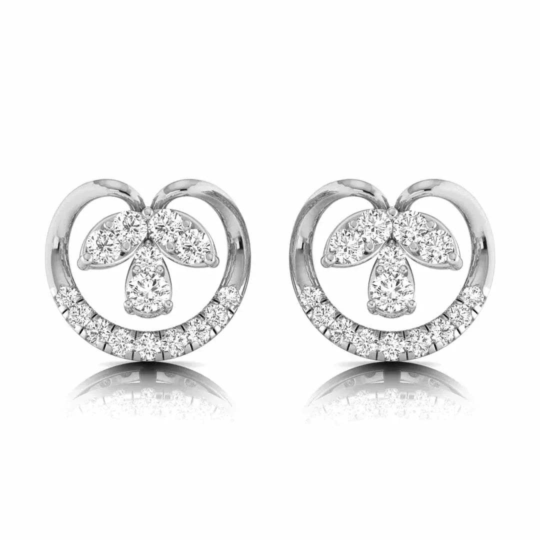 Pair of white gold stud earrings with diamond accents on a white background