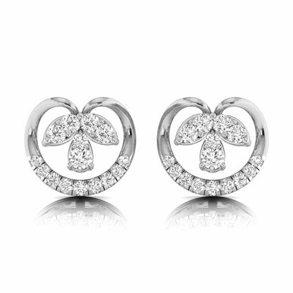 Pair of white gold stud earrings with diamond accents on a white background