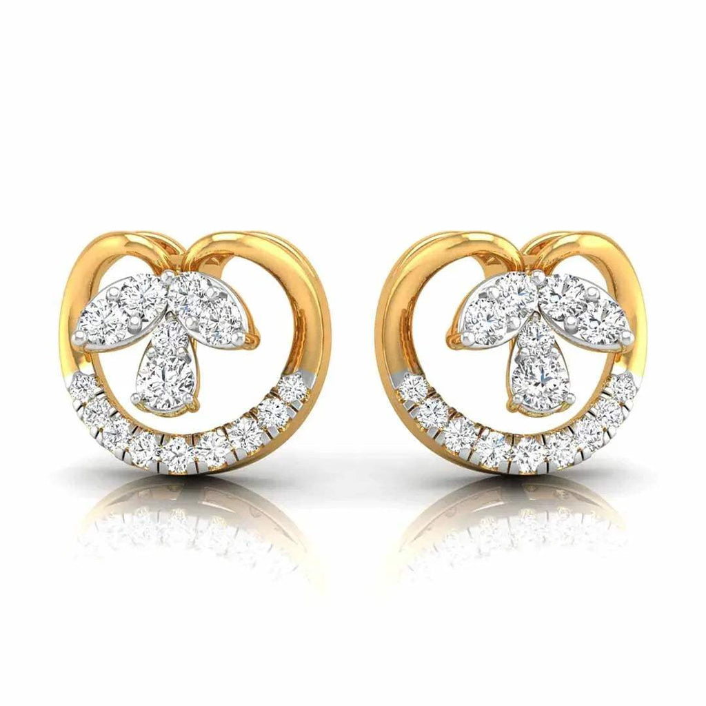 Pair of gold and diamond earrings on a white background