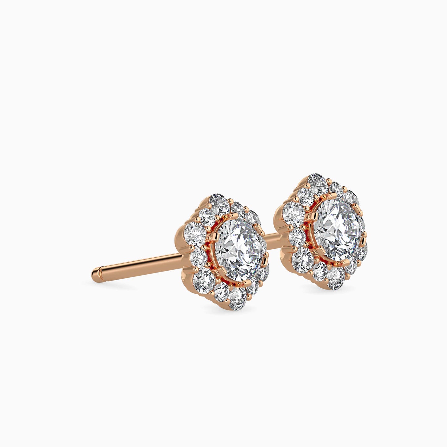 Rose gold earrings with clear diamond on a white background