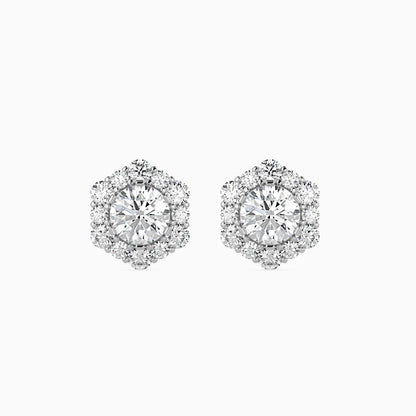 Pair of diamond earrings on a white background