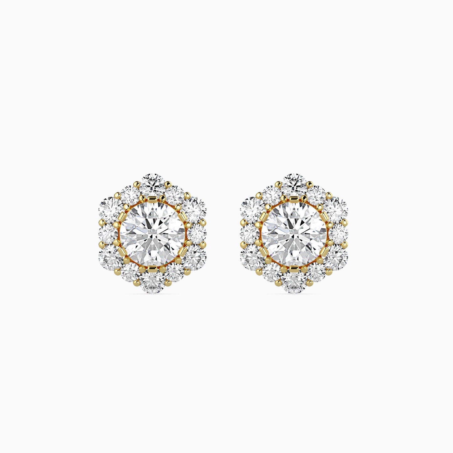 Pair of diamond earrings with gold accents on a white background