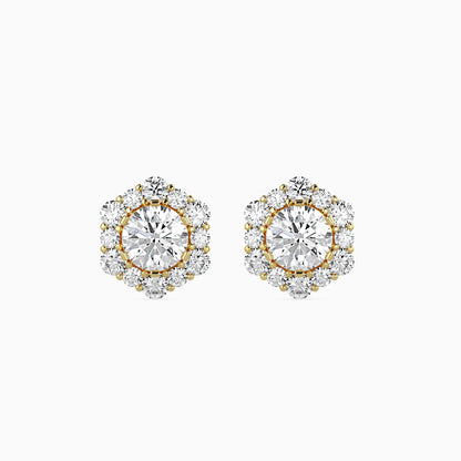 Pair of diamond earrings with gold accents on a white background
