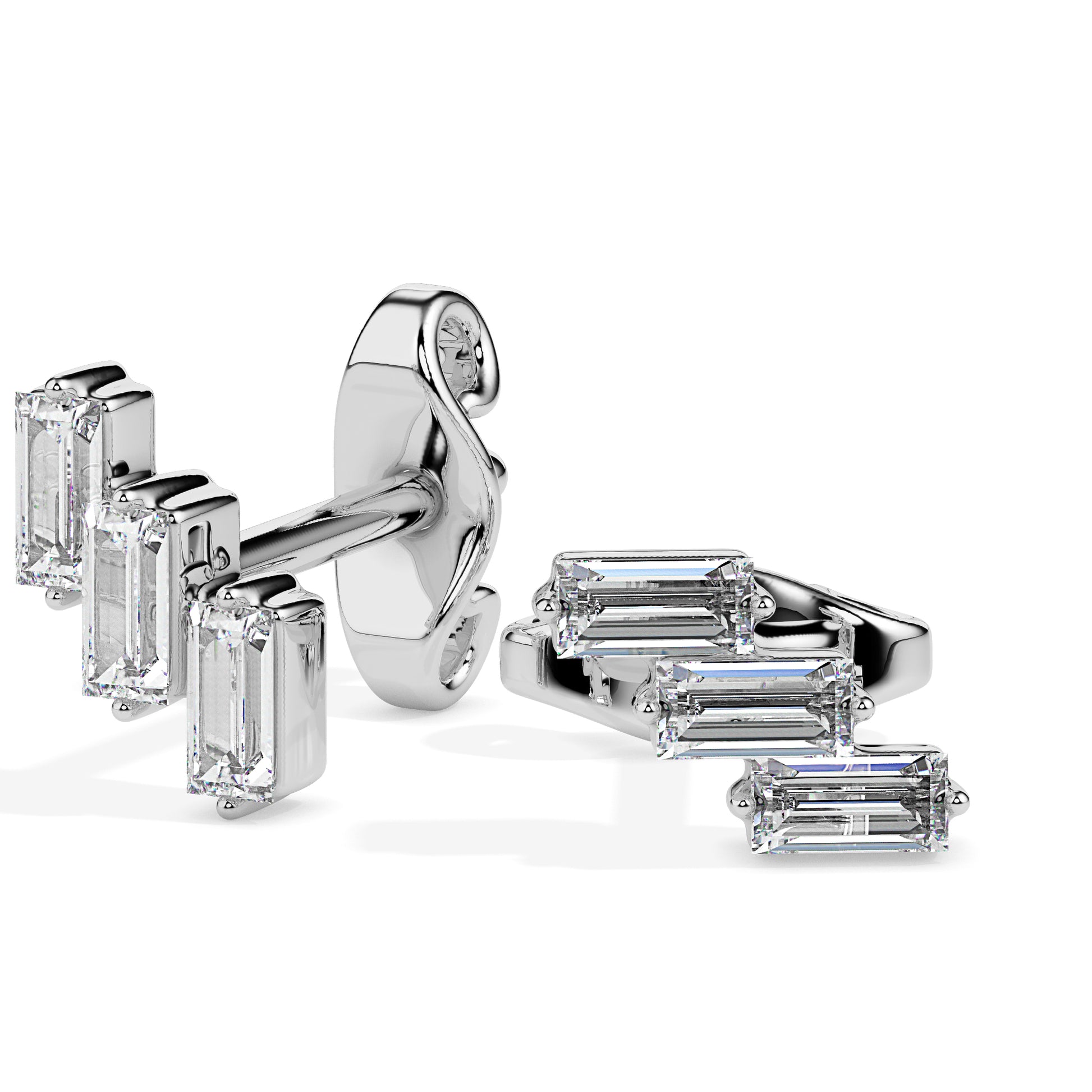 Pair of white gold earrings with emerald-cut gemstones on a white background.